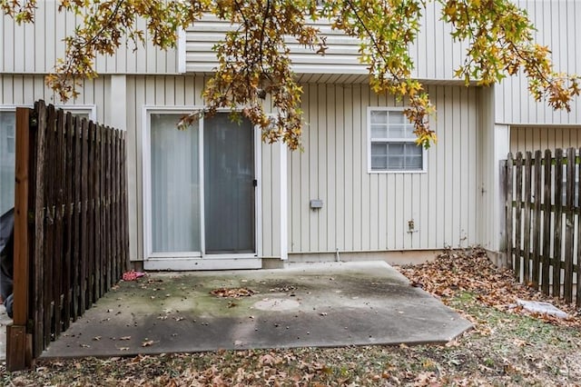 doorway to property with a patio area