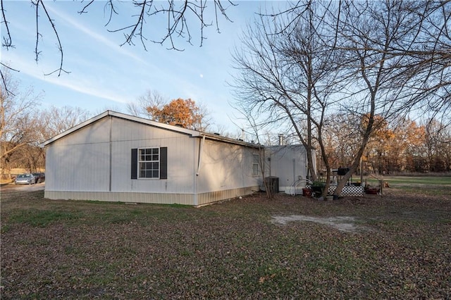 view of home's exterior featuring central AC unit