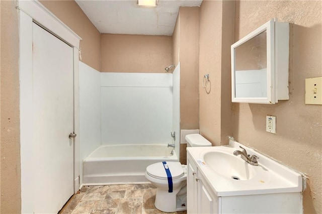 full bathroom with shower / bathtub combination, toilet, and vanity