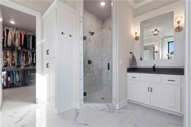 bathroom featuring vanity, walk in shower, and crown molding