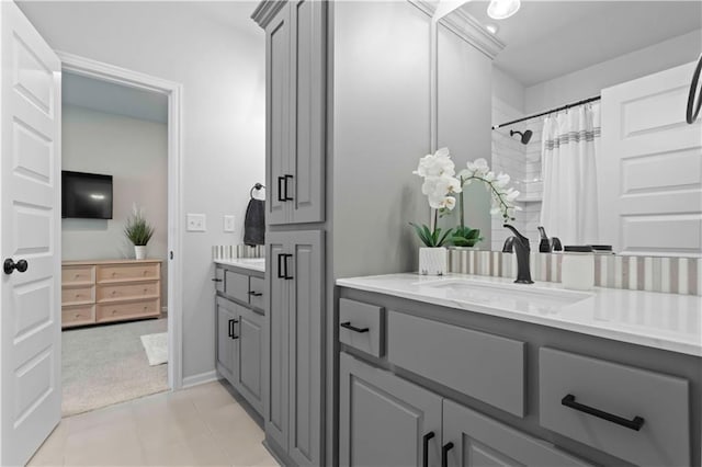 bathroom with vanity and tile patterned floors