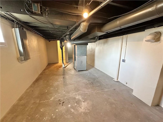 basement featuring heating unit