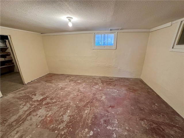 basement with a textured ceiling