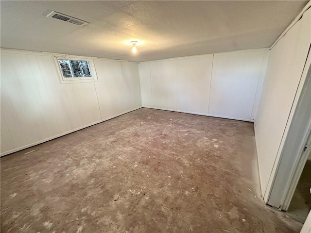 basement with a textured ceiling