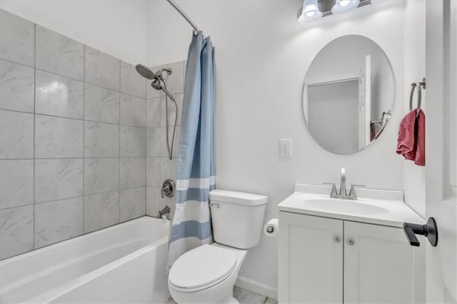 full bathroom with toilet, shower / tub combo, baseboards, and vanity