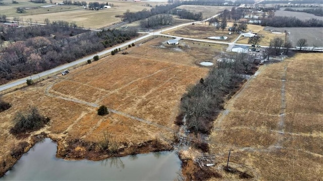 bird's eye view featuring a water view and a rural view