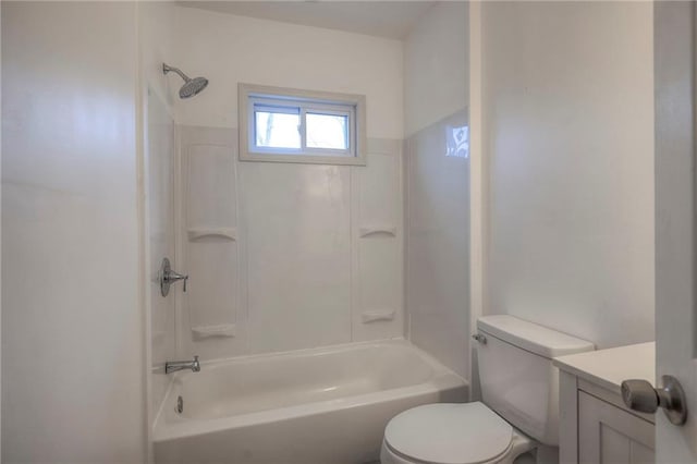 full bathroom with toilet, vanity, and washtub / shower combination