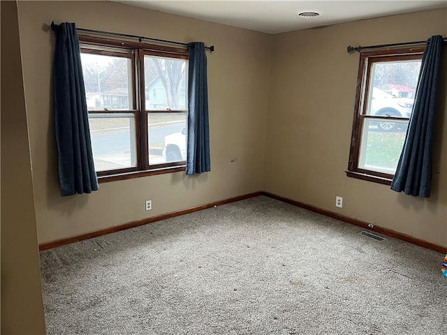 view of carpeted spare room