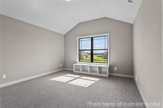 13450 W 179th Ter, Overland Park, KS 66013 - bonus room featuring baseboards, carpet floors, and vaulted ceiling