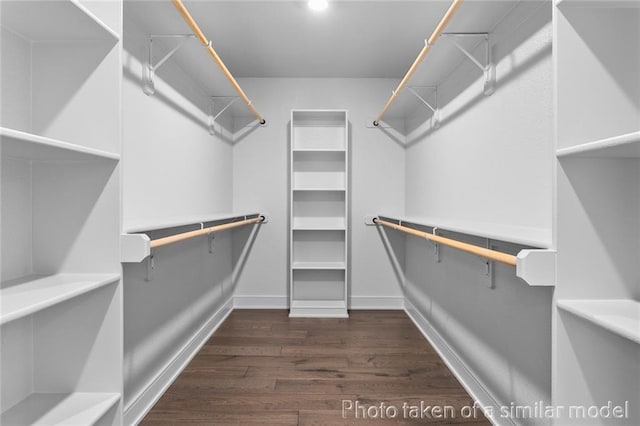 13450 W 179th Ter, Overland Park, KS 66013 - walk in closet featuring dark wood-style floors