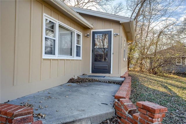 doorway to property with a patio