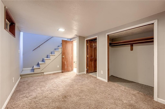 unfurnished bedroom with carpet flooring and a closet