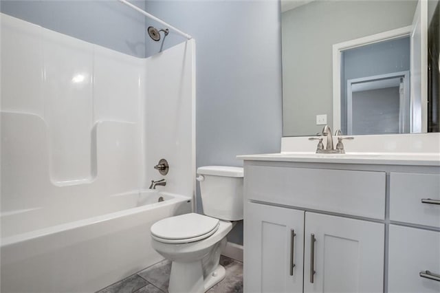 bathroom featuring shower / bath combination, vanity, and toilet