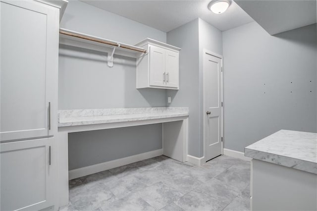 spacious closet with built in study area