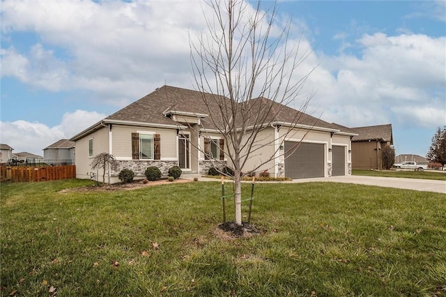 single story home featuring driveway, a front yard, a garage, and fence