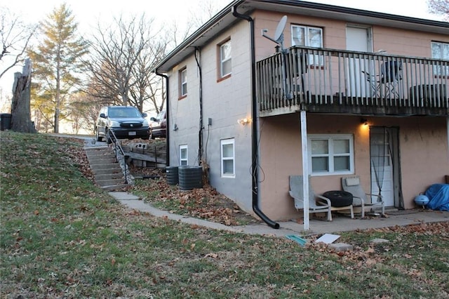 view of property exterior with cooling unit