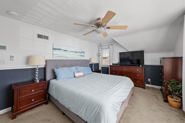 carpeted bedroom featuring ceiling fan and lofted ceiling