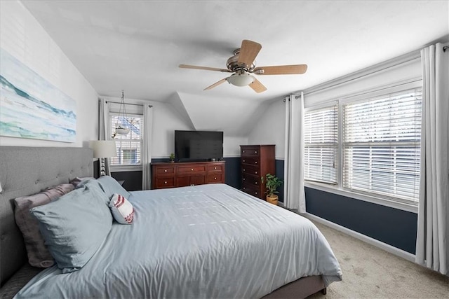 bedroom featuring ceiling fan, lofted ceiling, and carpet floors