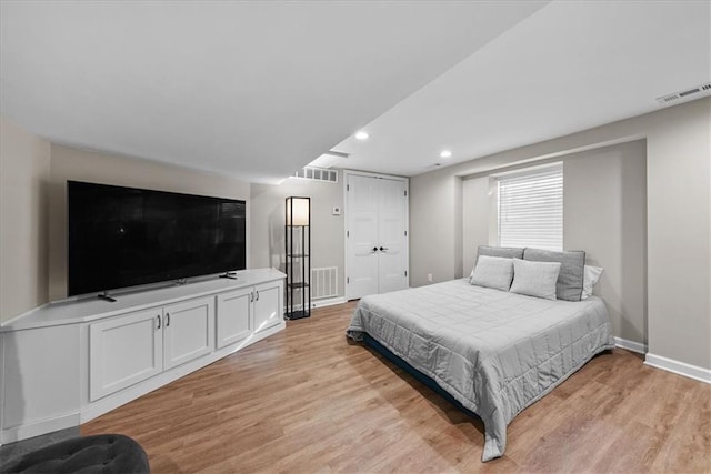 bedroom with light hardwood / wood-style floors