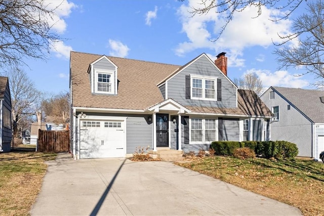 view of front of home with a front lawn and a garage