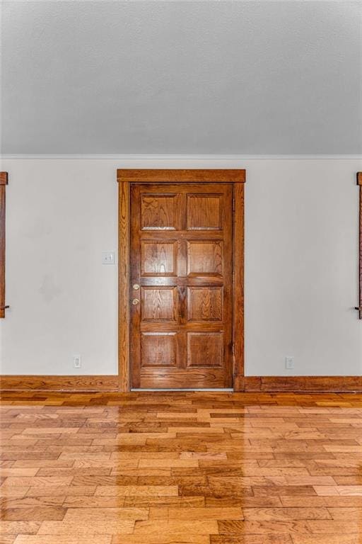 spare room featuring light hardwood / wood-style flooring