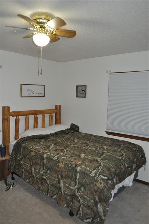 bedroom featuring carpet flooring and ceiling fan