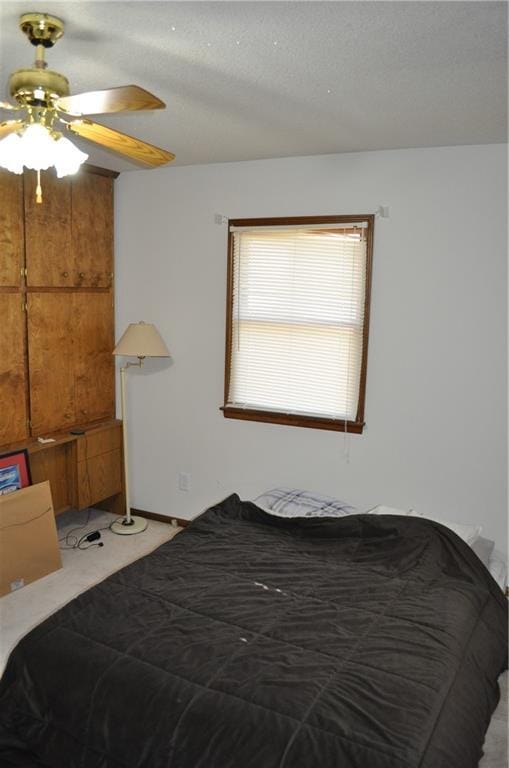 bedroom featuring carpet floors and ceiling fan