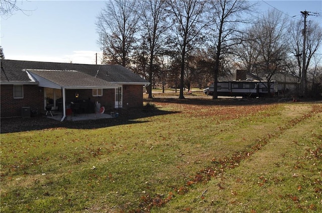 view of yard with a patio area