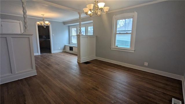 unfurnished dining area featuring dark hardwood / wood-style floors, ornamental molding, and a chandelier