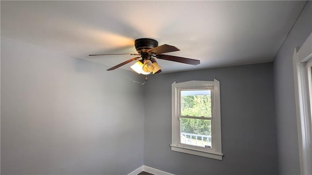 spare room featuring ceiling fan