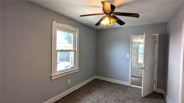 unfurnished bedroom featuring ceiling fan and carpet floors