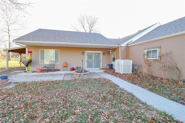 back of property featuring a patio