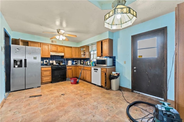 kitchen featuring tasteful backsplash, brown cabinetry, stainless steel appliances, under cabinet range hood, and open shelves