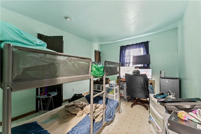 bedroom featuring tile patterned floors