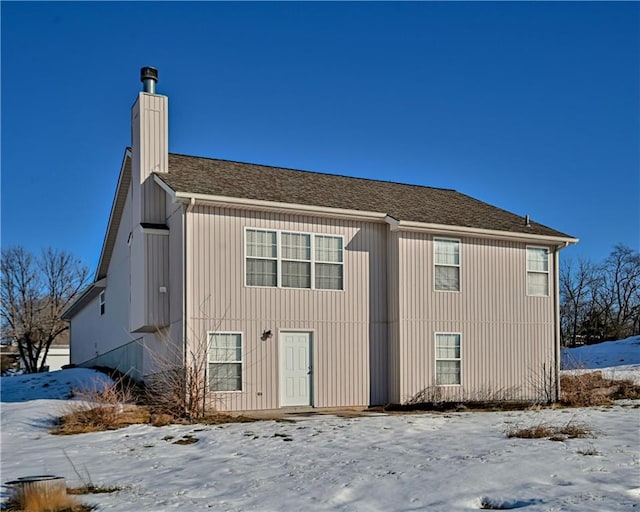 view of snow covered property