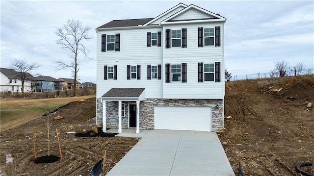 view of front of property with a garage