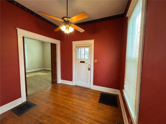 entrance foyer with hardwood / wood-style flooring and ceiling fan