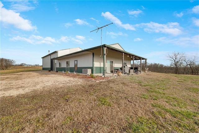 view of home's exterior with a yard