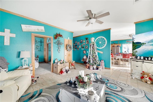 interior space with crown molding, ceiling fan, and light tile patterned floors