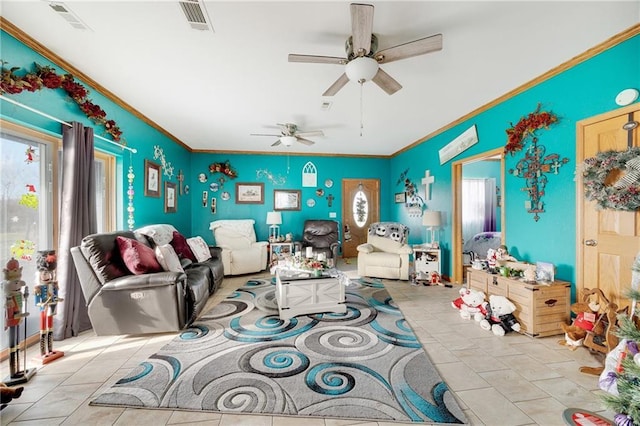 tiled living room featuring ceiling fan and ornamental molding