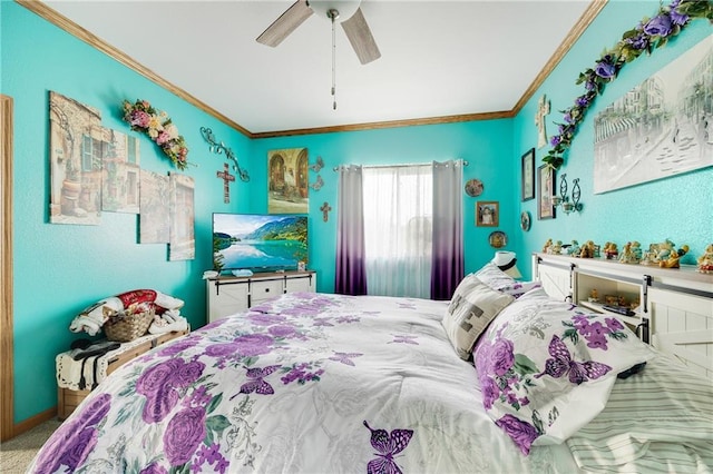 carpeted bedroom with ceiling fan and ornamental molding