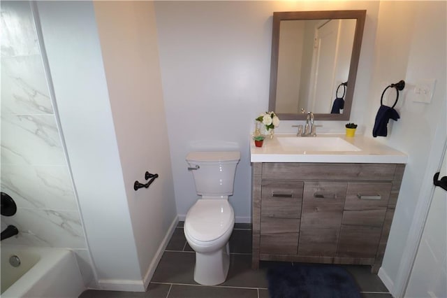 bathroom featuring tile patterned floors, vanity, and toilet