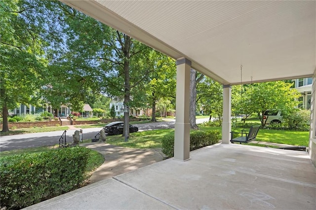 view of patio featuring a porch