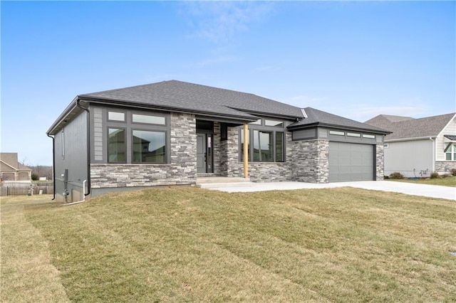 prairie-style house with a garage and a front yard