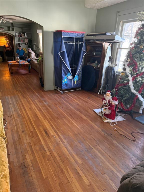 interior space featuring hardwood / wood-style flooring and ceiling fan