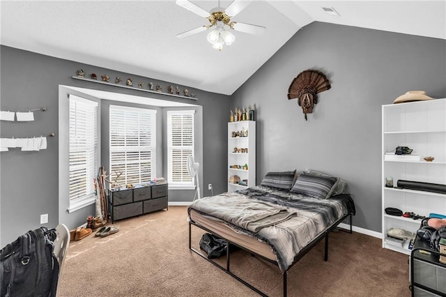 bedroom with carpet flooring, ceiling fan, and vaulted ceiling