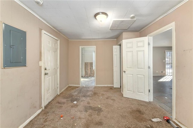 interior space featuring ornamental molding and electric panel