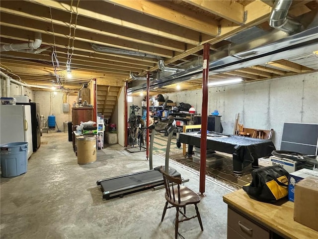 basement featuring white fridge and pool table