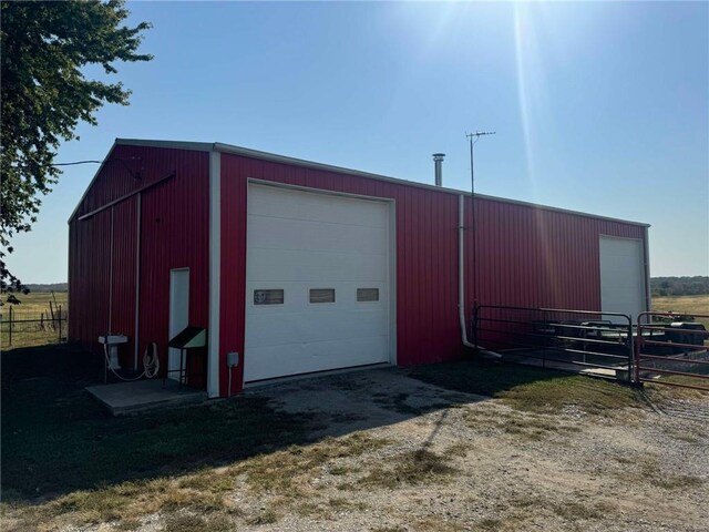 view of outdoor structure featuring a garage