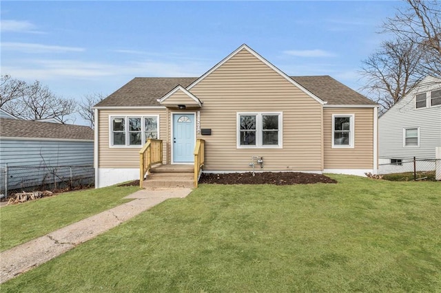 bungalow-style home featuring a front yard